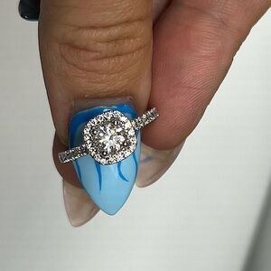 Unworn elegance: pristine engagement ring+wedding band, original boxes &details.